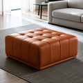 Pouf rectangulaire capitonné aux lignes épurées, coloris orange